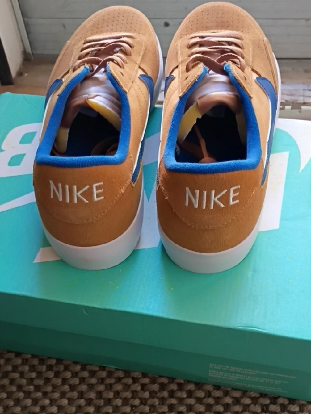 Nike Men’s Sneakers in Tan with Blue Swoosh